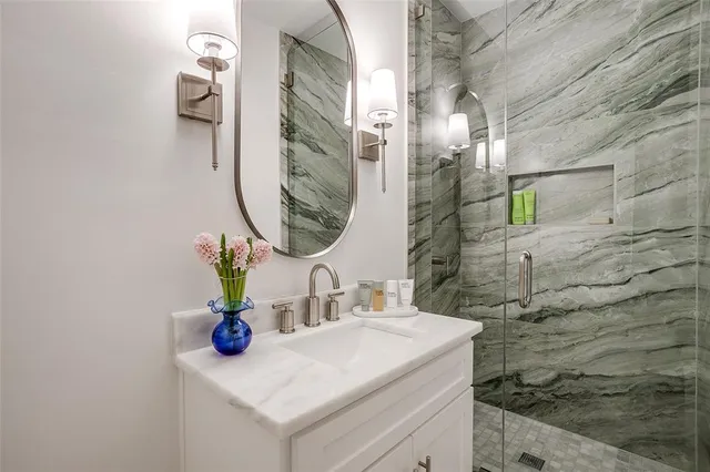 a bathroom with a sink and a mirror