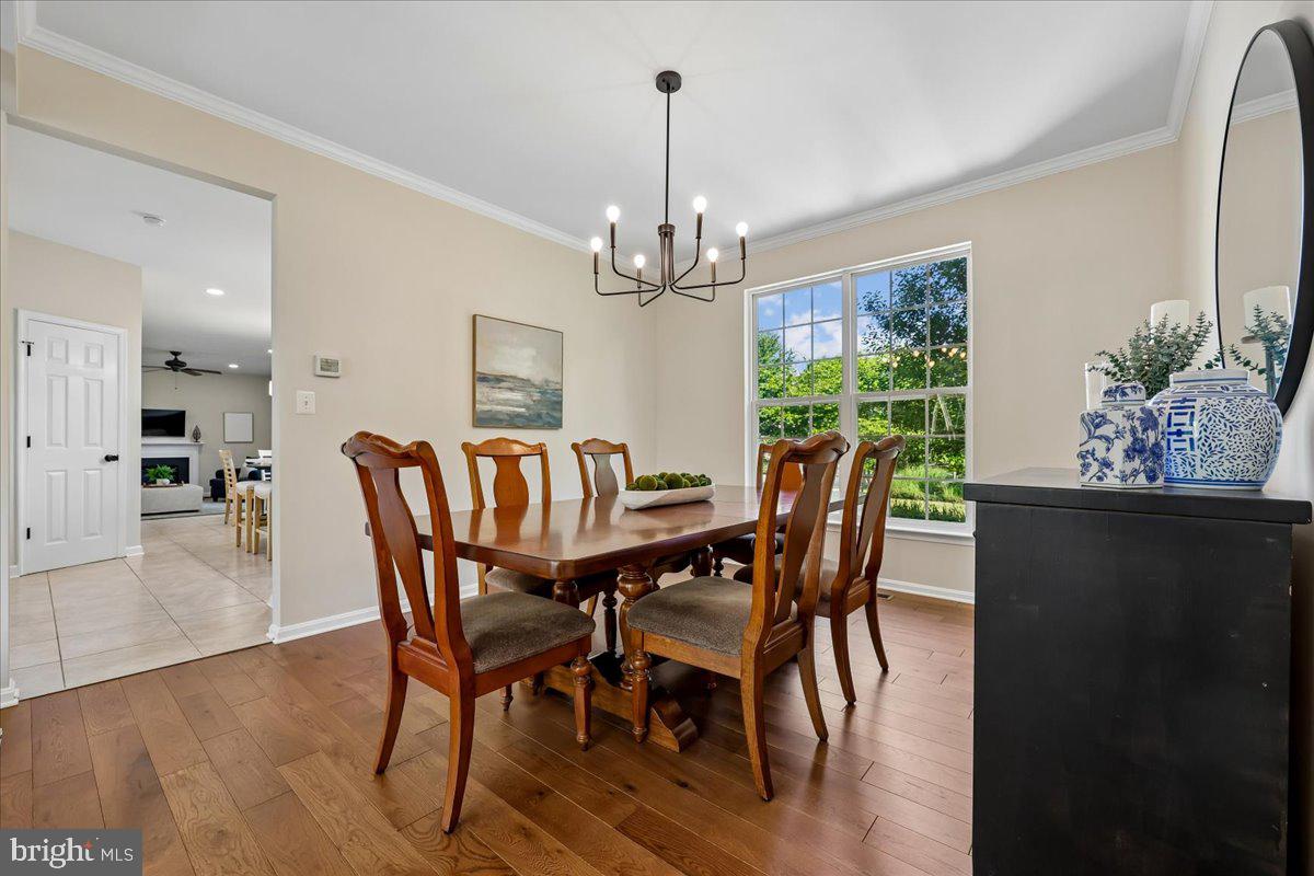 107 Redcloud Court Frederick, MD 21702 - Photo 12 of 78 Elegant dining space with natural light.