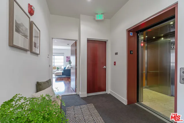 an outdoor living room with furniture