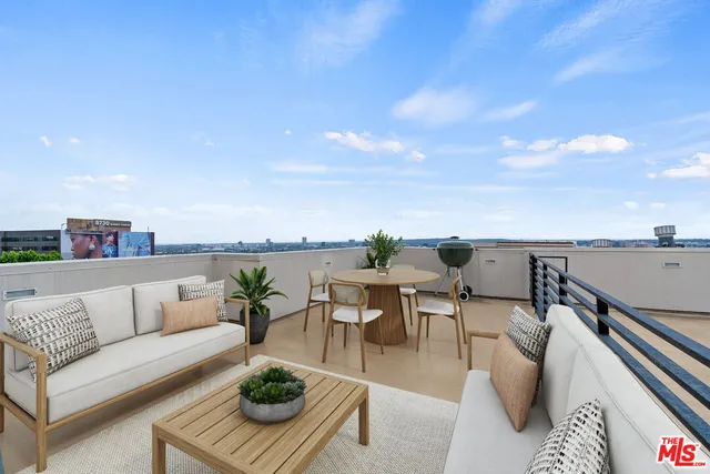 a view of city with tall buildings