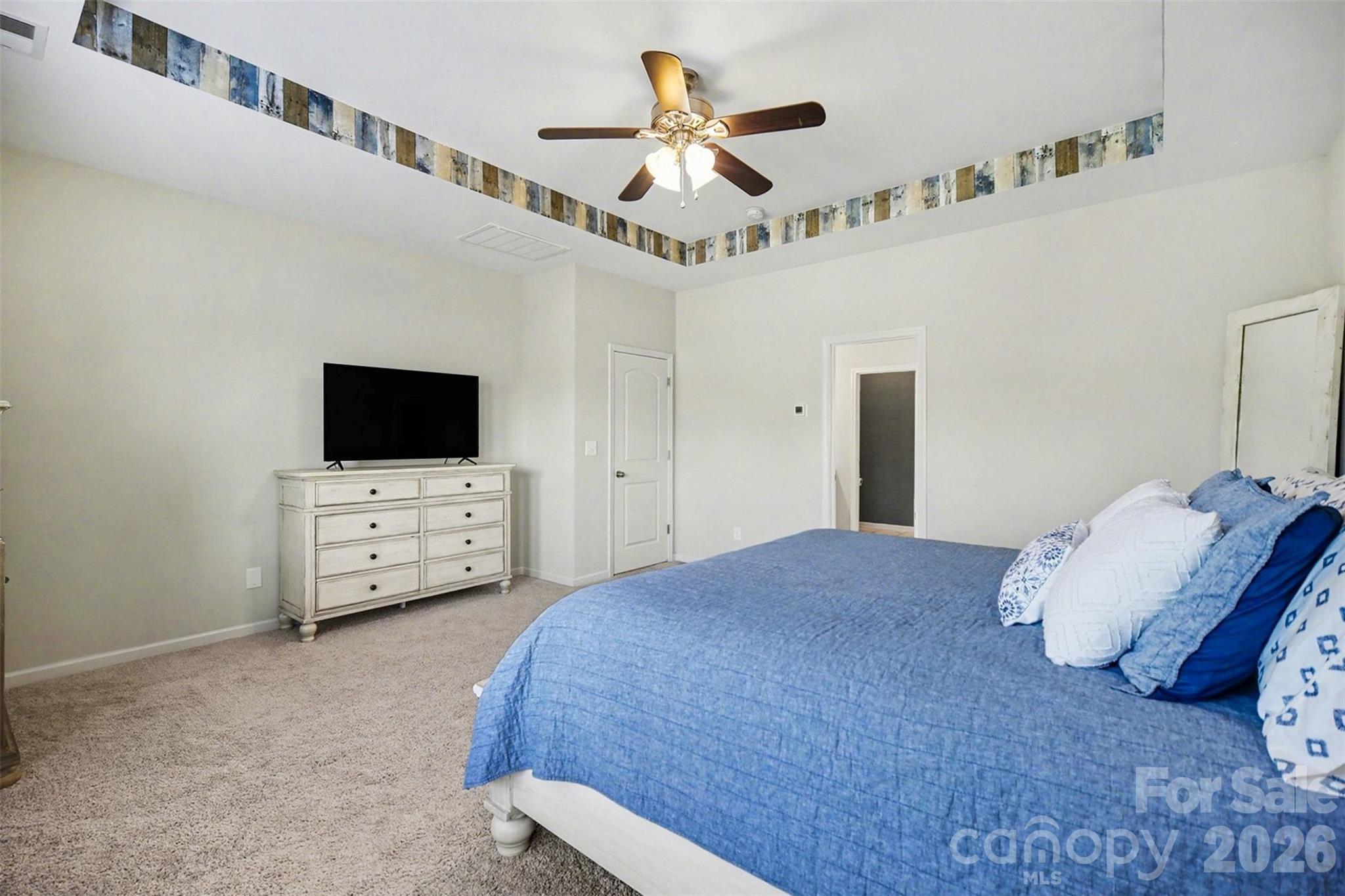 514 Tack Lane Midland, NC 28107 - Photo 25 of 48 a living room with furniture and a flat screen tv