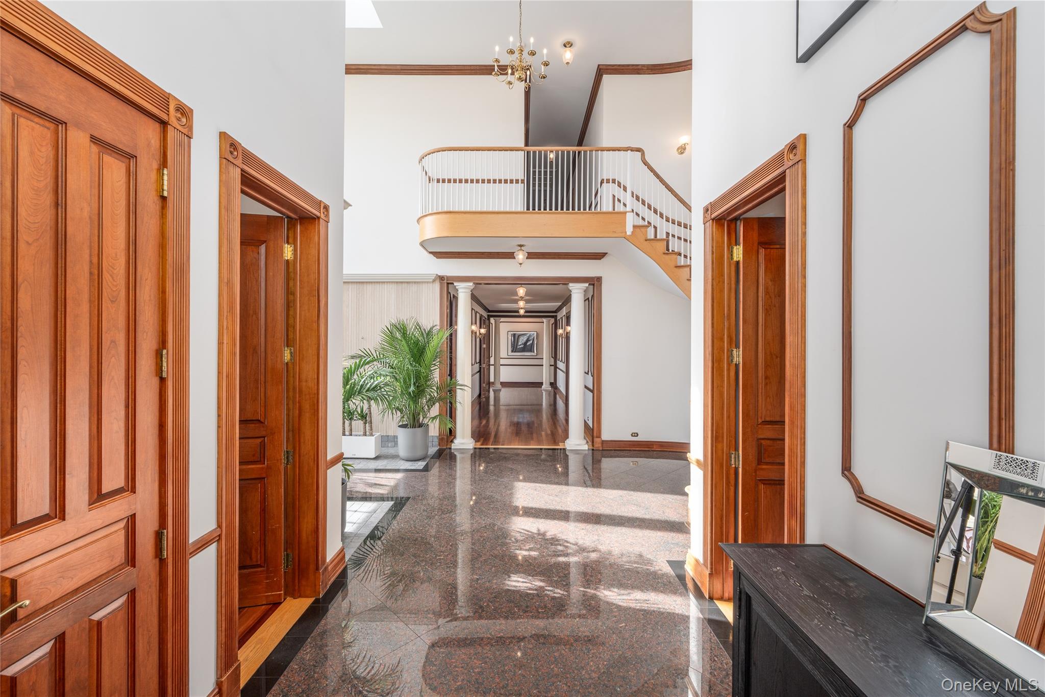6133 Sound Avenue Riverhead, NY 11901 - Photo 11 of 42 a view of a hallway with furniture and front door