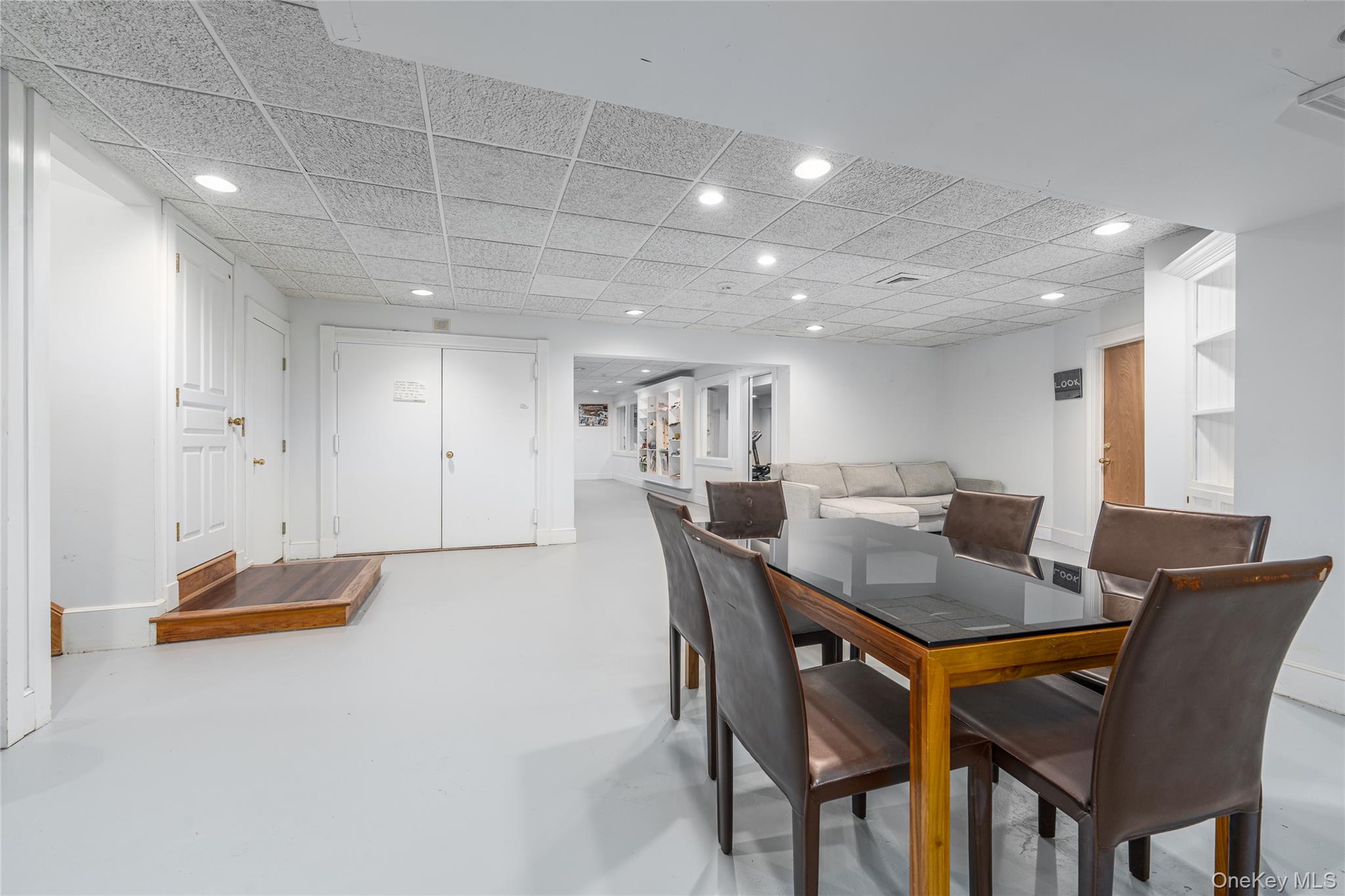 6133 Sound Avenue Riverhead, NY 11901 - Photo 28 of 42 a view of a dining room with furniture