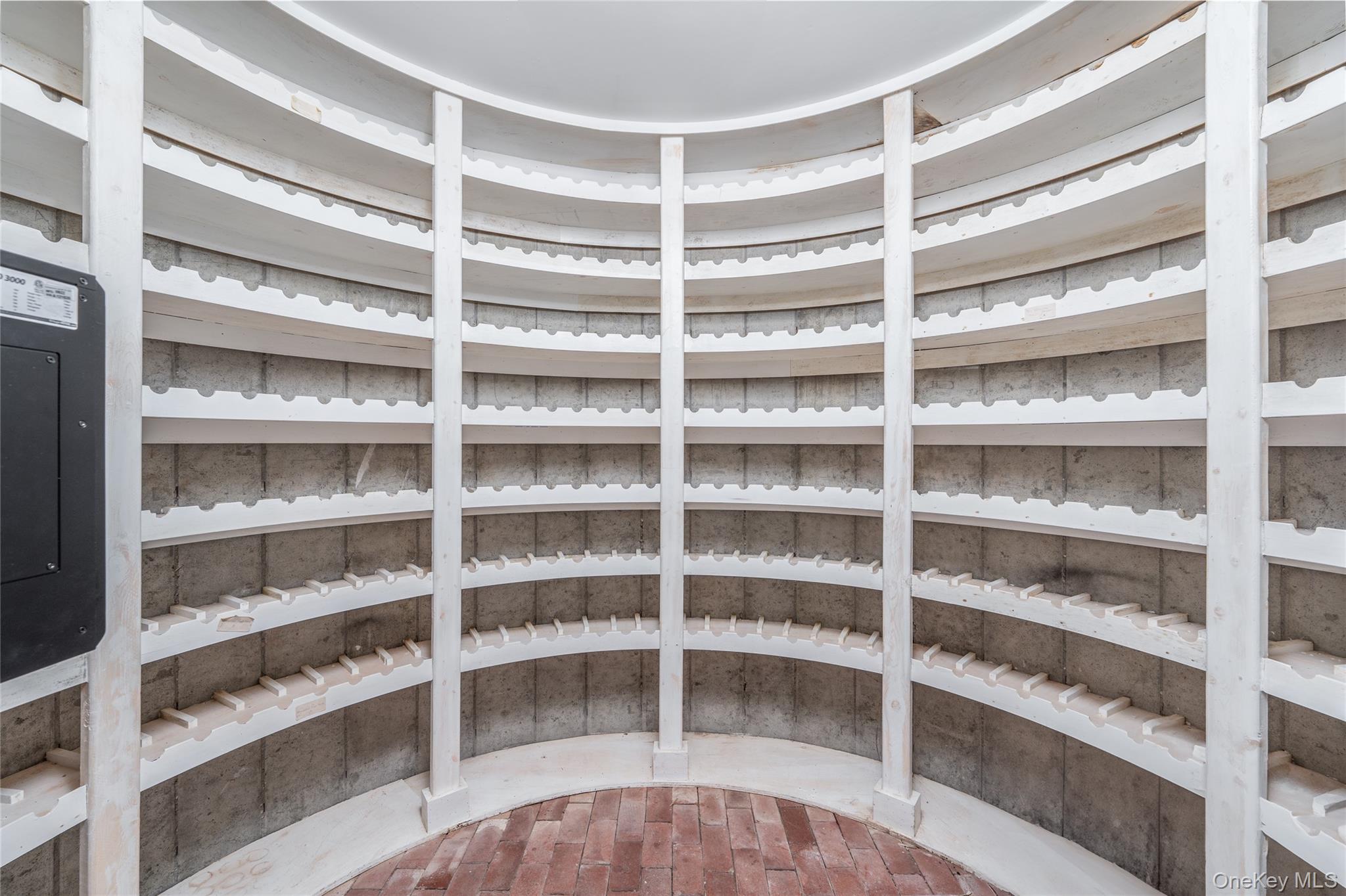 6133 Sound Avenue Riverhead, NY 11901 - Photo 30 of 42 a view of a room with empty shelves