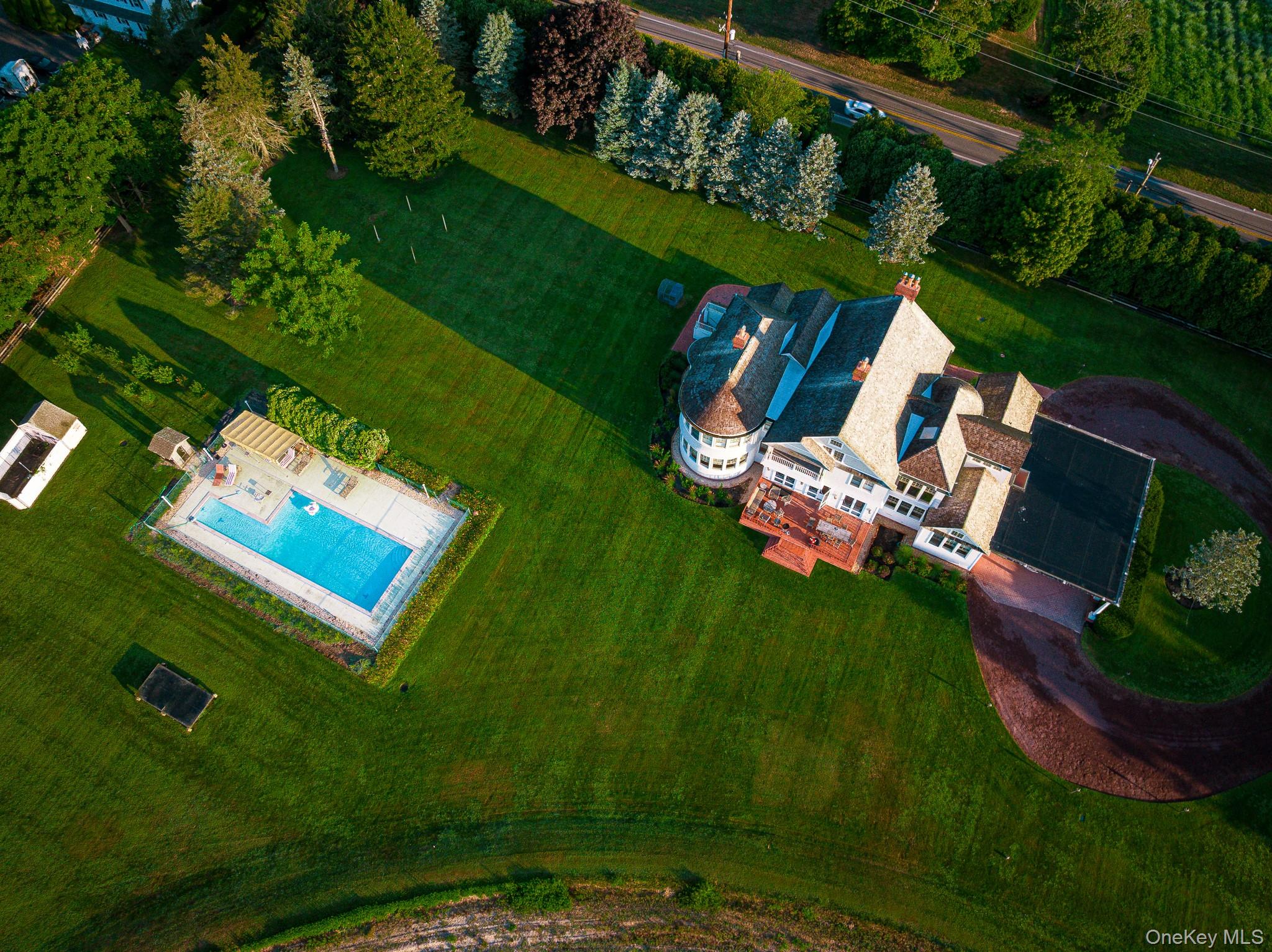 6133 Sound Avenue Riverhead, NY 11901 - Photo 3 of 42 an aerial view of a house having outdoor space