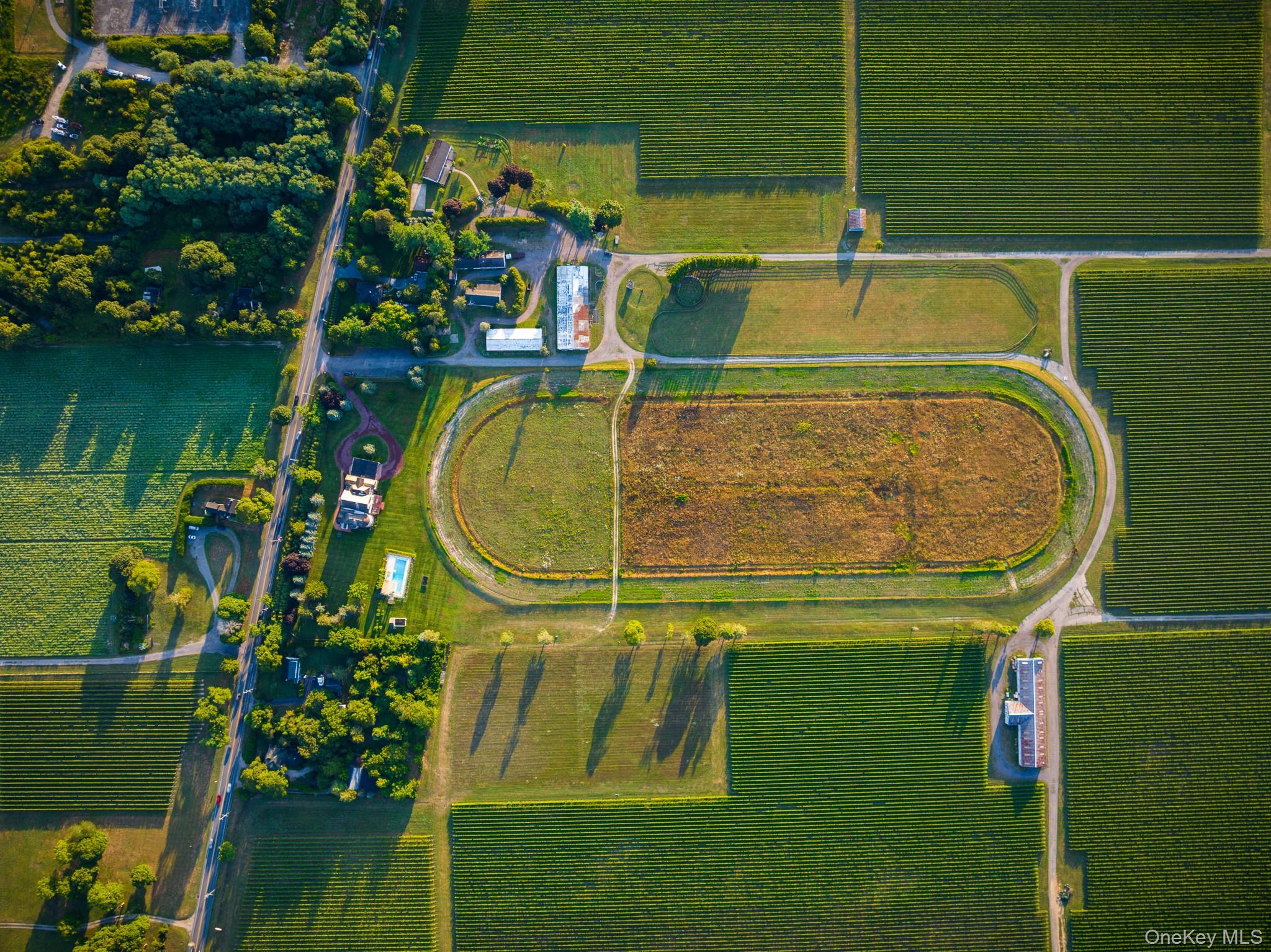 6133 Sound Avenue Riverhead, NY 11901 - Photo 34 of 42 a bird view of a lake