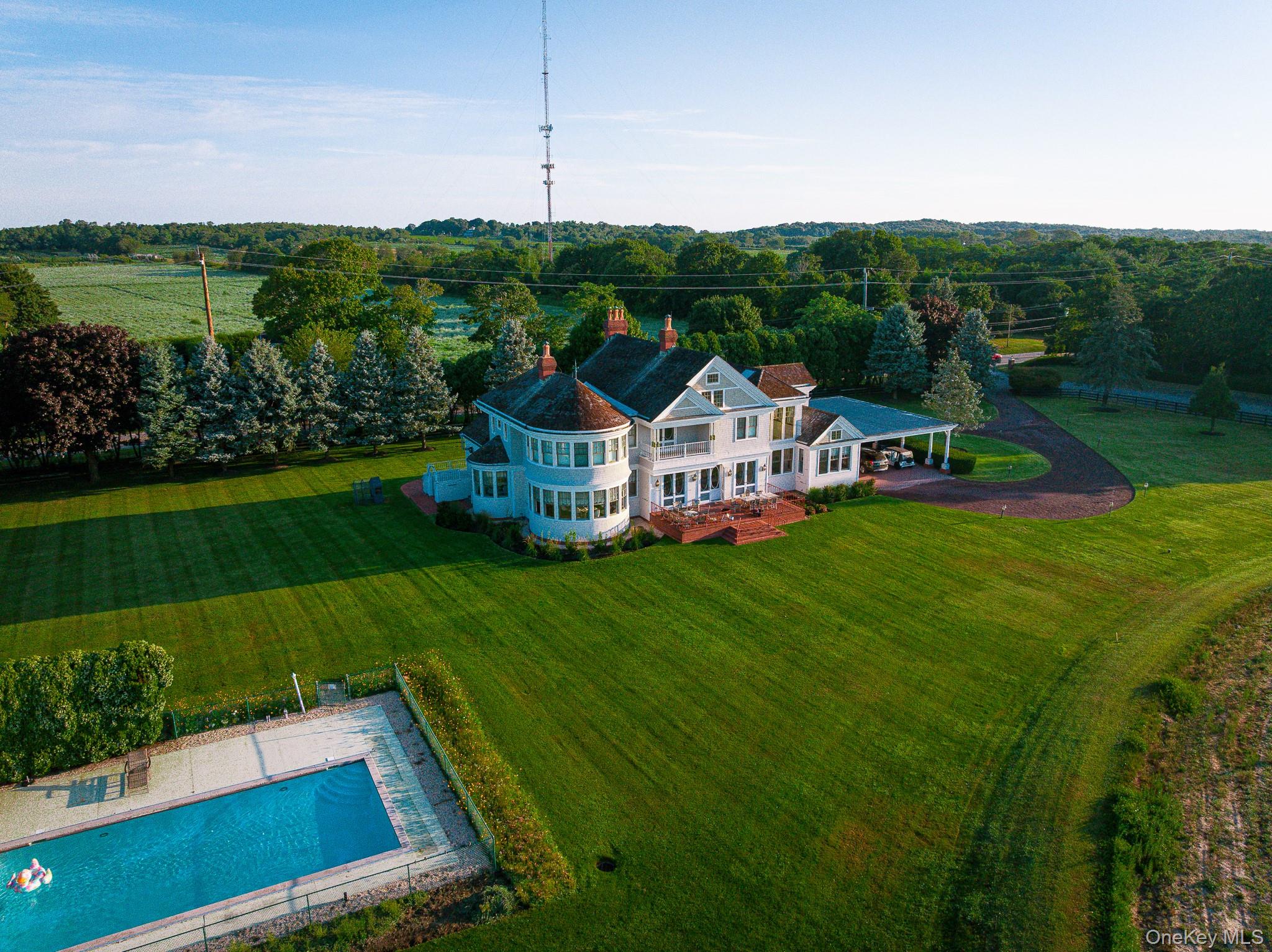 6133 Sound Avenue Riverhead, NY 11901 - Photo 4 of 42 a view of a house with a big yard
