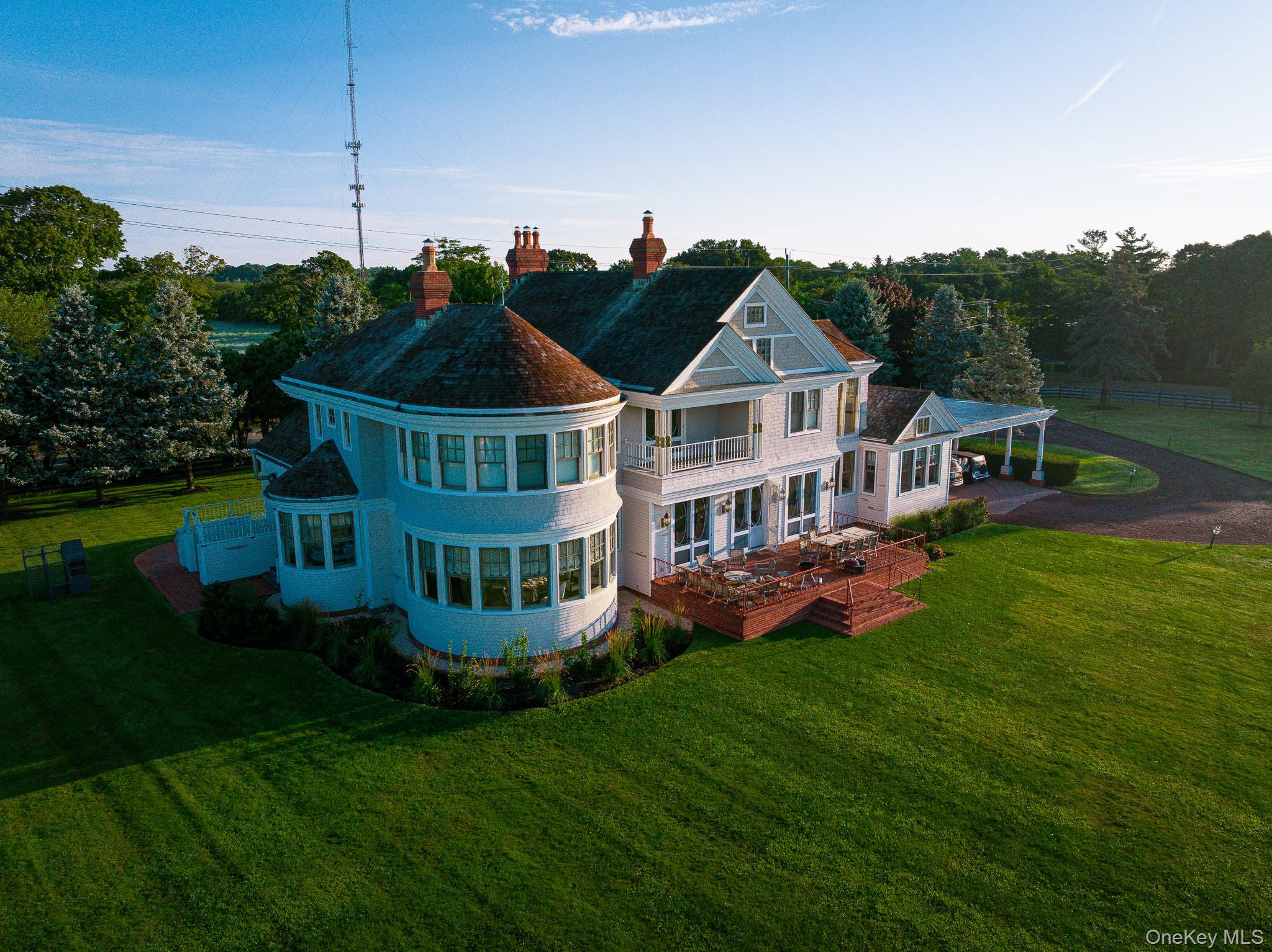 6133 Sound Avenue Riverhead, NY 11901 - Photo 42 of 42 a view of a house with a big yard