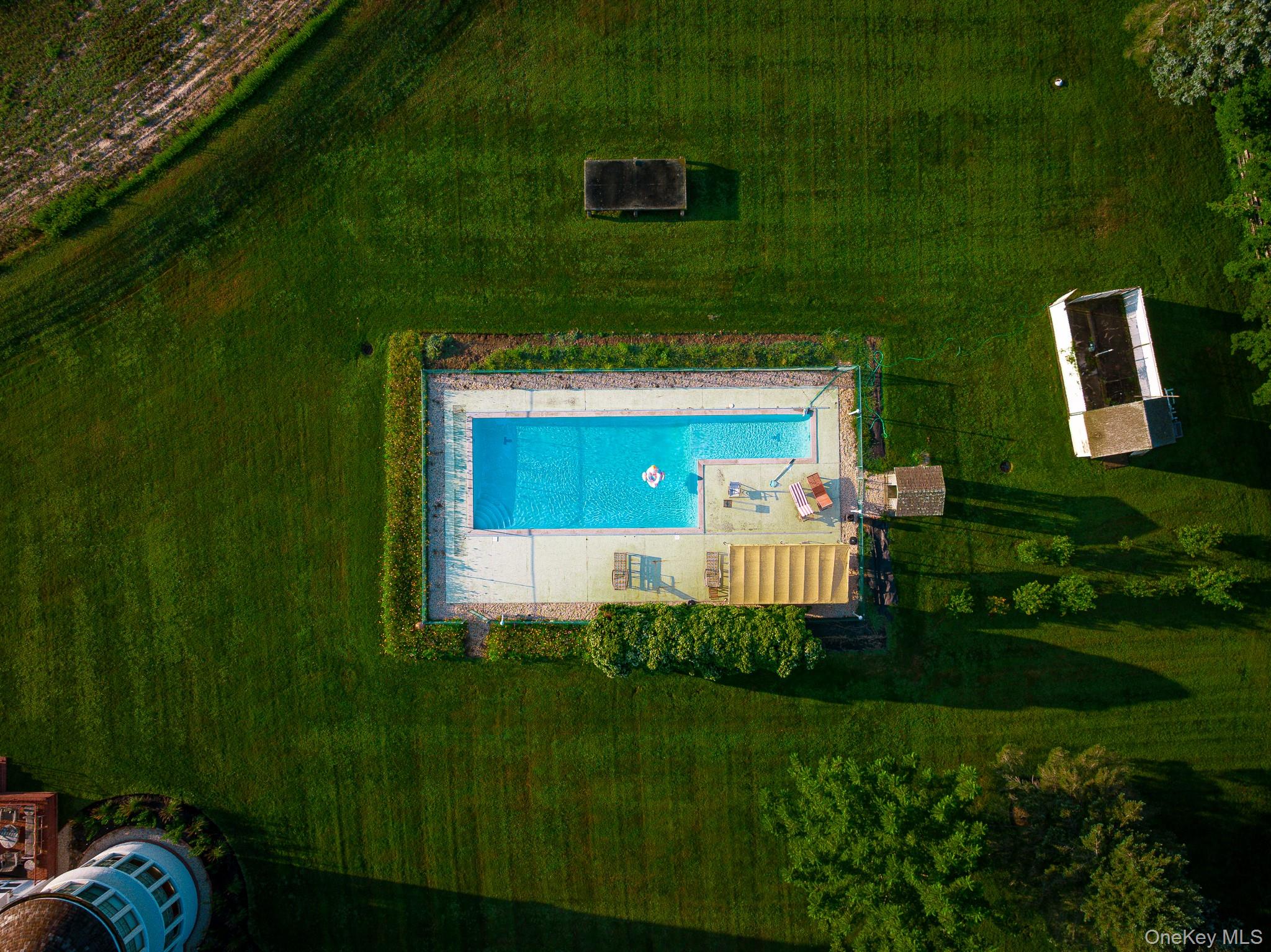 6133 Sound Avenue Riverhead, NY 11901 - Photo 5 of 42 a view of a house with a backyard