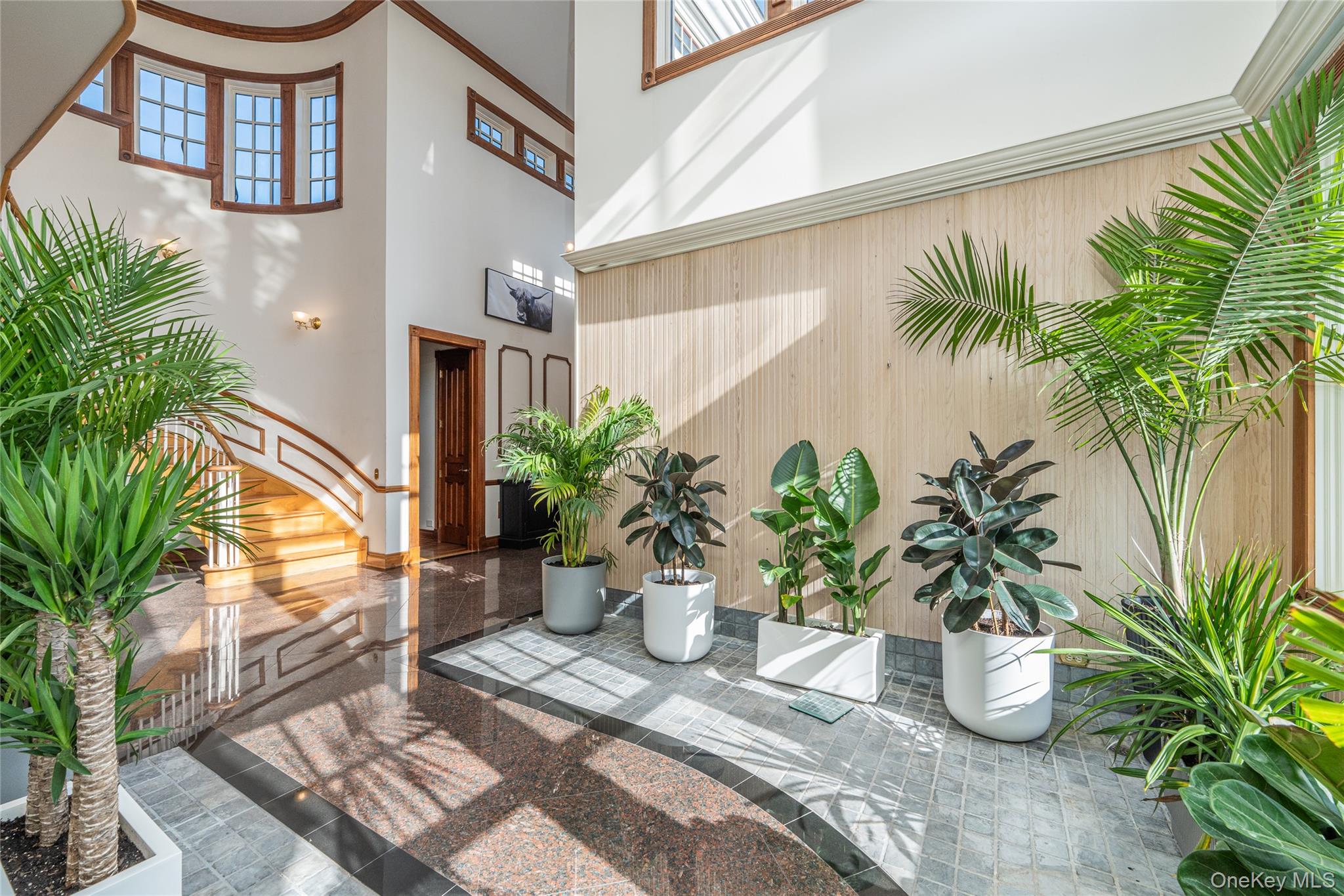 6133 Sound Avenue Riverhead, NY 11901 - Photo 10 of 42 a view of a potted plants with water fountain in front of a house