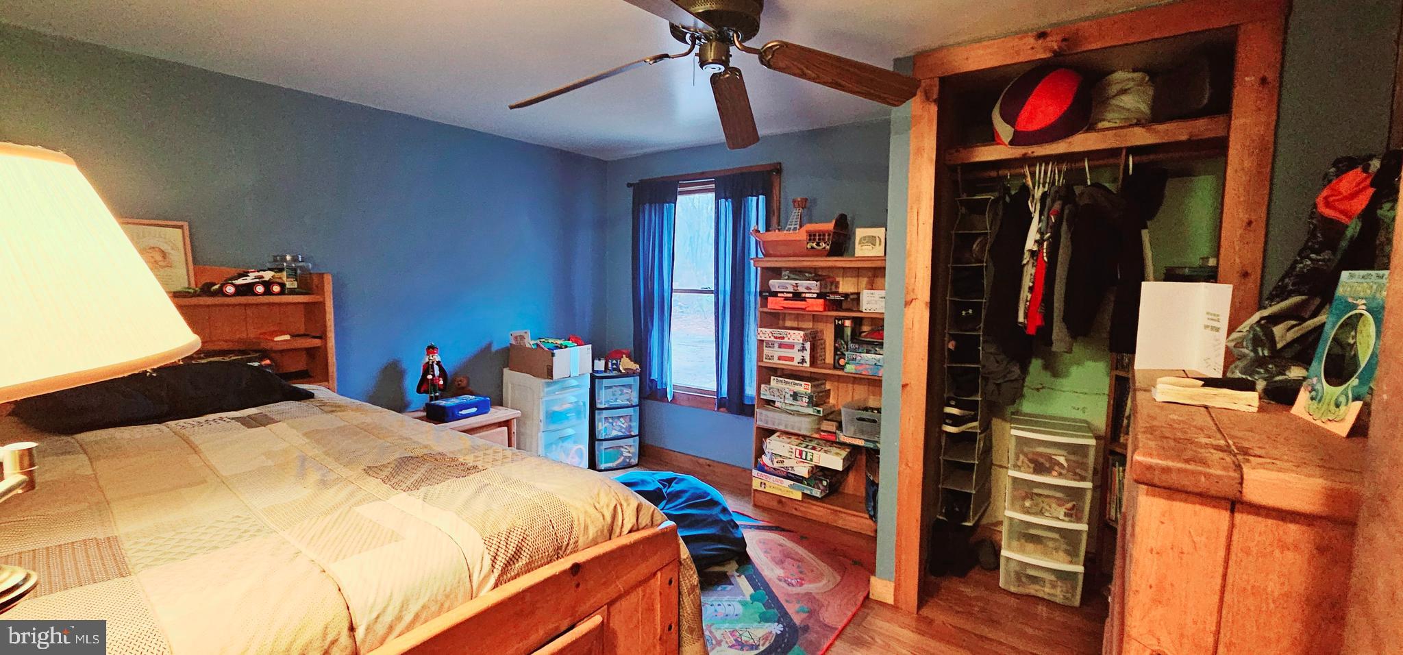 2 Dare Avenue Heislerville, NJ 08324 - Photo 18 of 22 a bed sitting in a bedroom next to a window