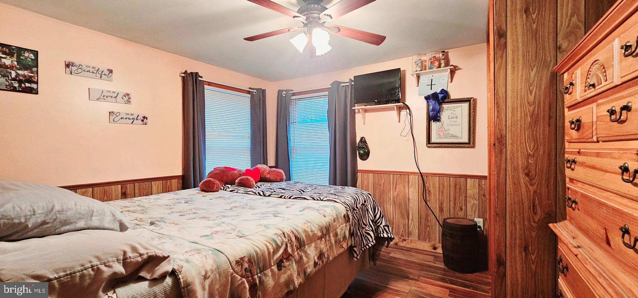 2 Dare Avenue Heislerville, NJ 08324 - Photo 19 of 22 a bedroom with a large bed and a chandelier