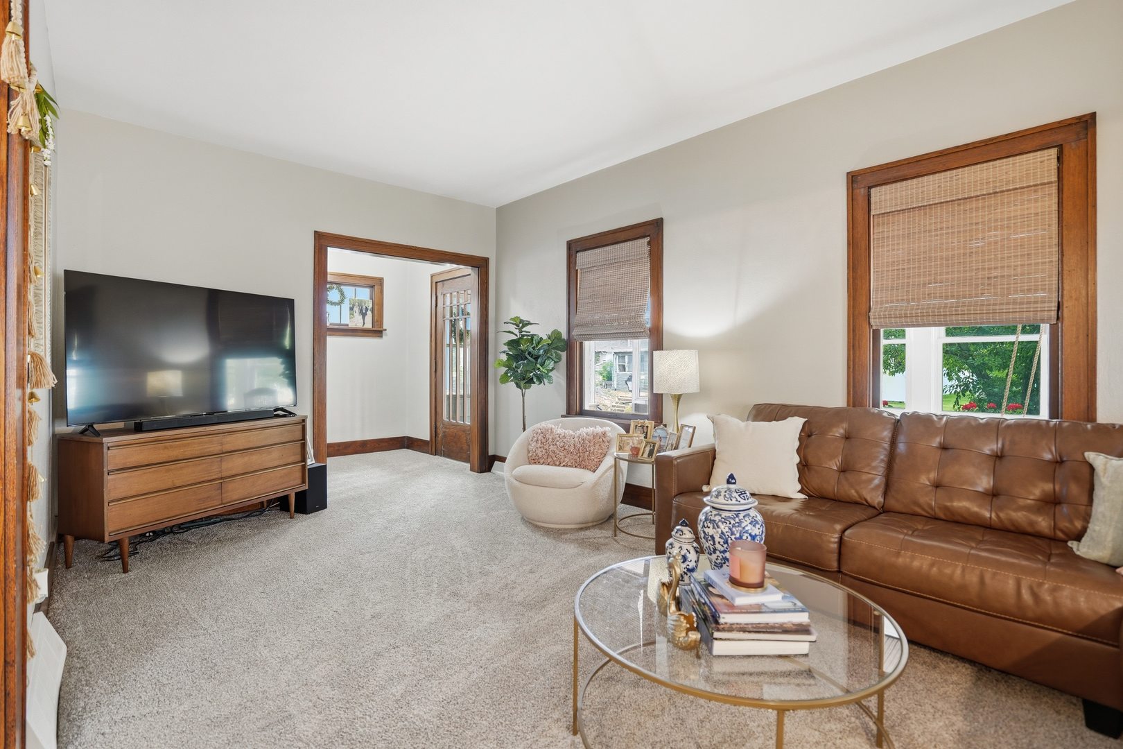 2431 14th Avenue Moline, IL 61265 - Photo 7 of 37 a living room with furniture and a flat screen tv