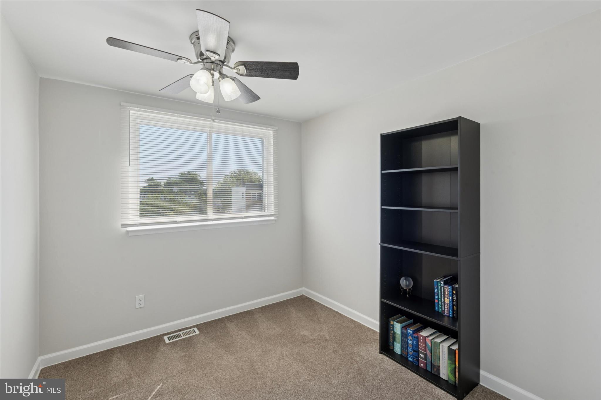12218 Aster Road Philadelphia, PA 19154 - Photo 12 of 25 an empty room with shelves