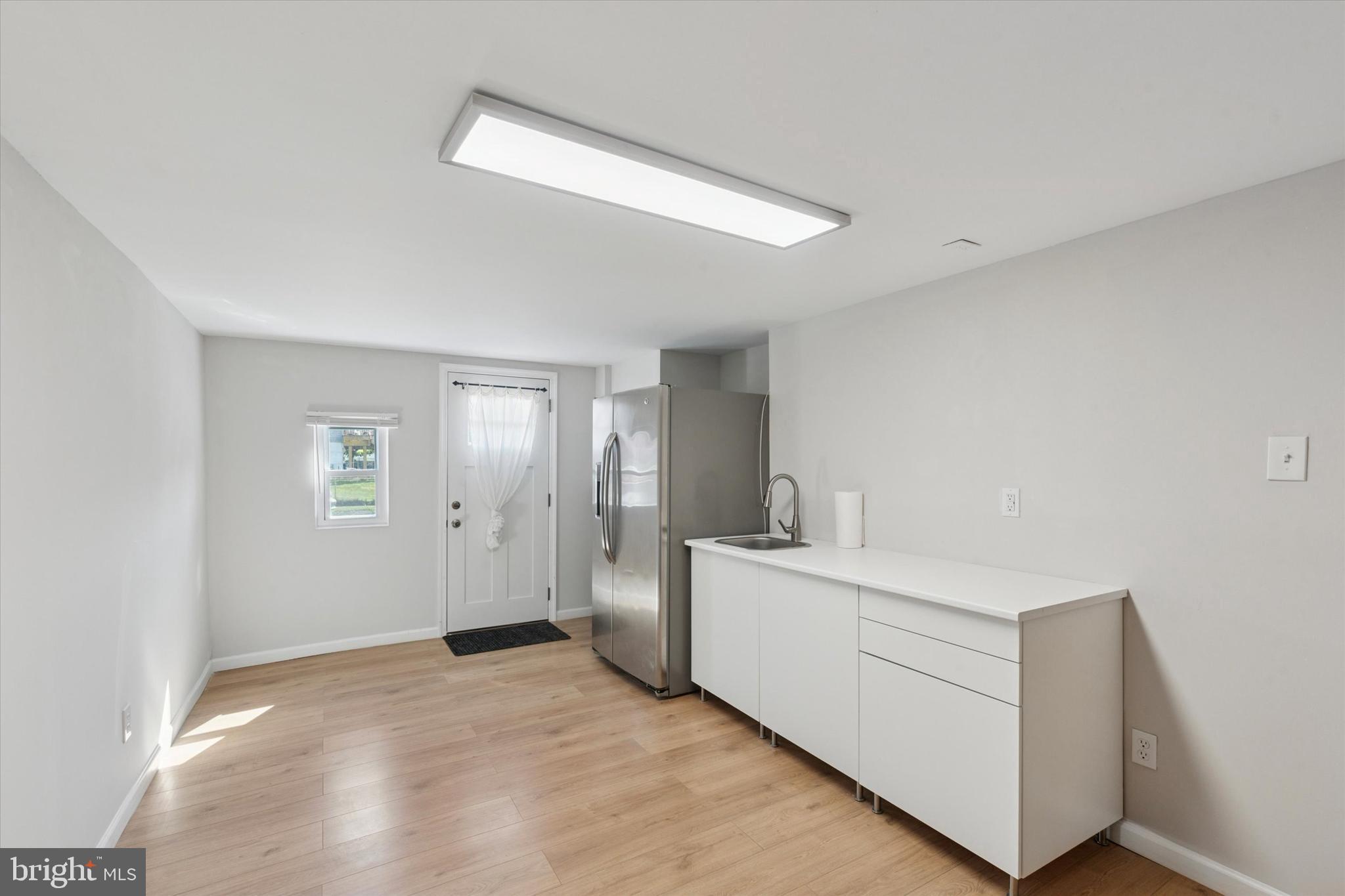 12218 Aster Road Philadelphia, PA 19154 - Photo 18 of 25 a view of a kitchen with white cabinets