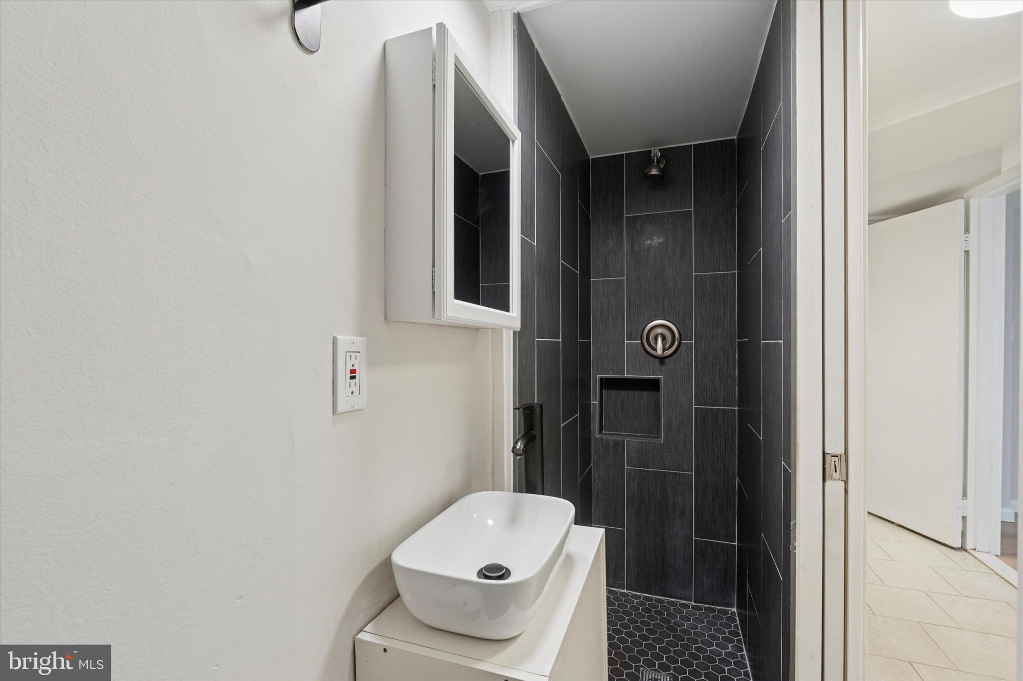 12218 Aster Road Philadelphia, PA 19154 - Photo 19 of 25 a bathroom with a toilet and a shower