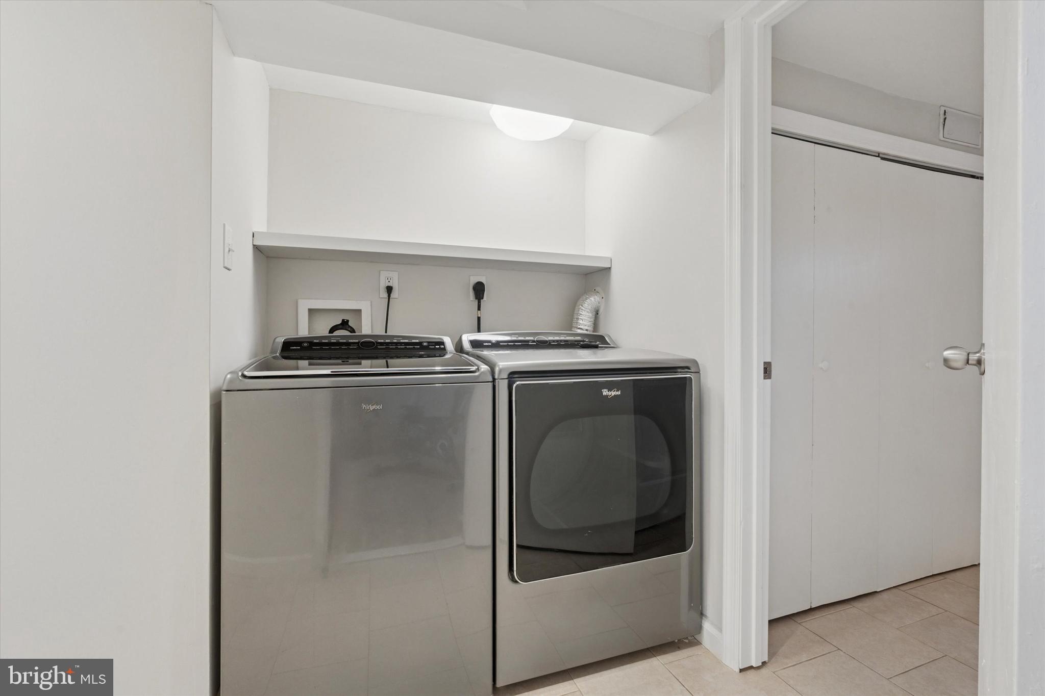 12218 Aster Road Philadelphia, PA 19154 - Photo 22 of 25 a utility room with washer and dryer