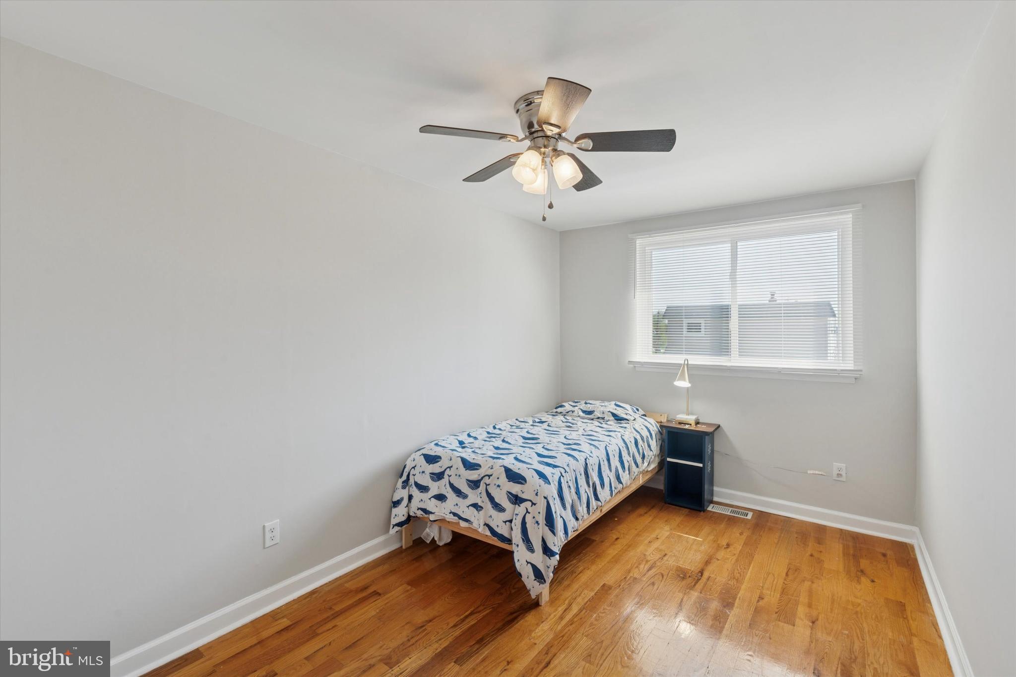12218 Aster Road Philadelphia, PA 19154 - Photo 10 of 25 a bedroom with a bed and a window