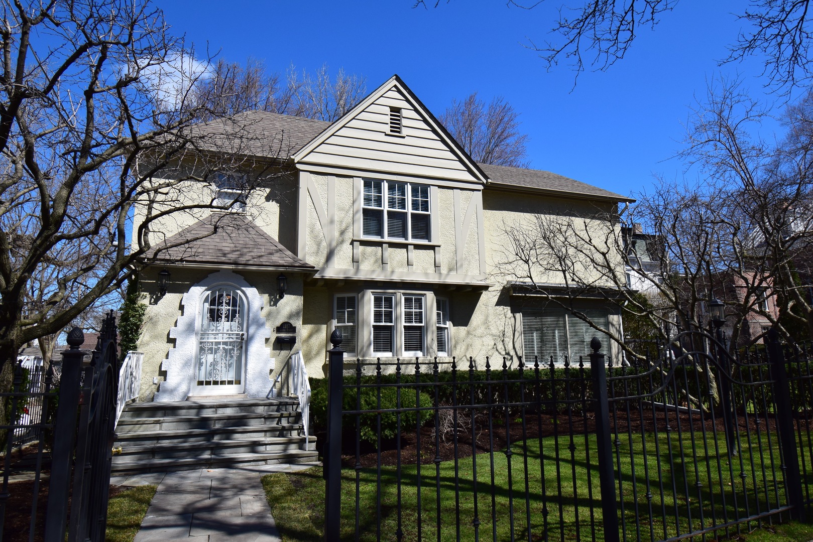 1317 Lyons Street Evanston, IL 60201 - Photo 2 of 46 a front view of a house with a porch