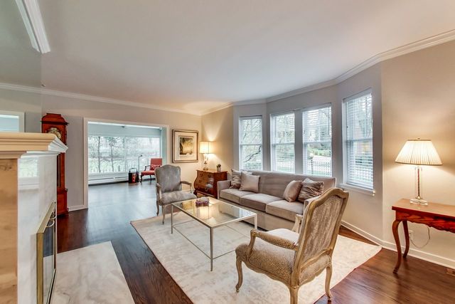 1317 Lyons Street Evanston, IL 60201 - Photo 15 of 46 a living room with fireplace furniture and a large window