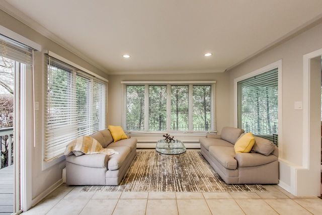 1317 Lyons Street Evanston, IL 60201 - Photo 18 of 46 a living room with furniture and a large window