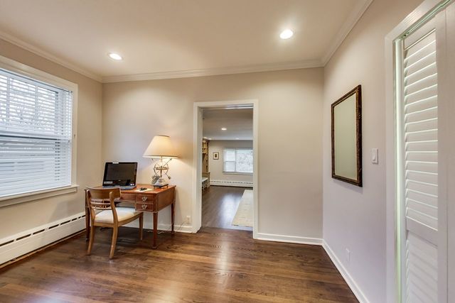 1317 Lyons Street Evanston, IL 60201 - Photo 22 of 46 a view of a workspace with furniture and a window