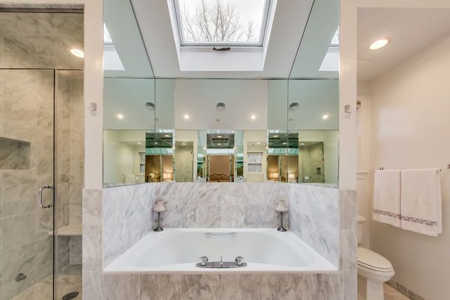 1317 Lyons Street Evanston, IL 60201 - Photo 30 of 46 a bathroom with a bathtub and shower