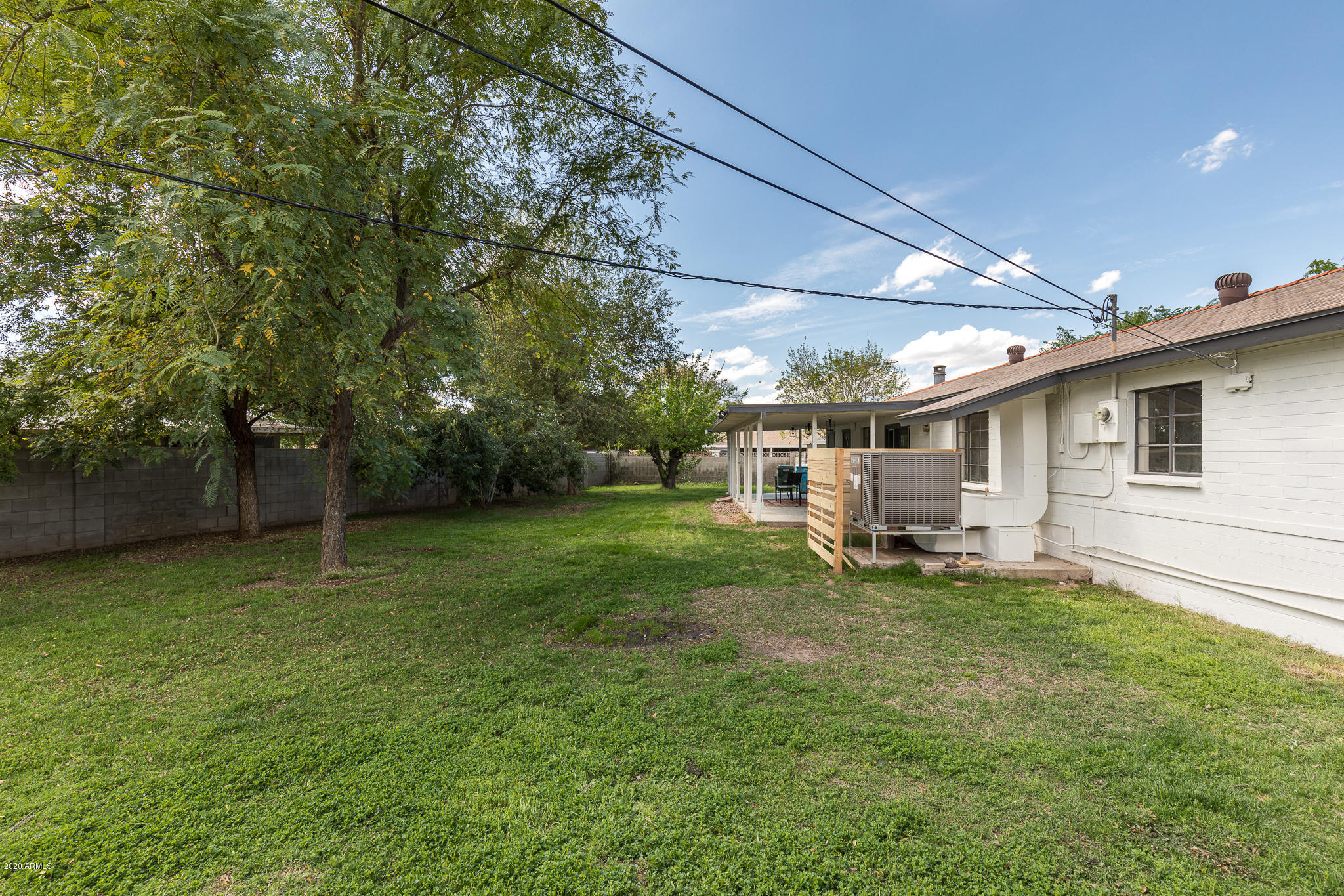 901 East Rovey Avenue Phoenix, AZ 85014 - Photo 26 of 28 Mature trees in rear yard