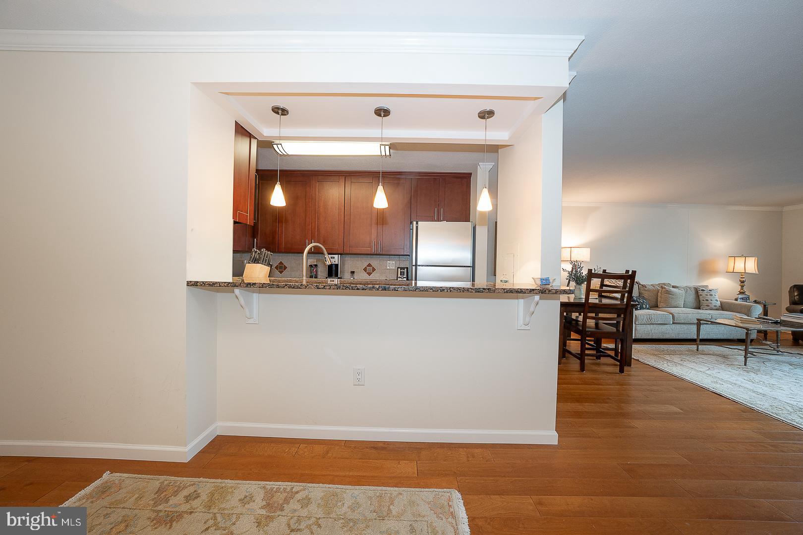 1919 Chestnut Street, Unit 2822 Philadelphia, PA 19103 - Photo 13 of 36 a view of dining room with furniture and chandelier