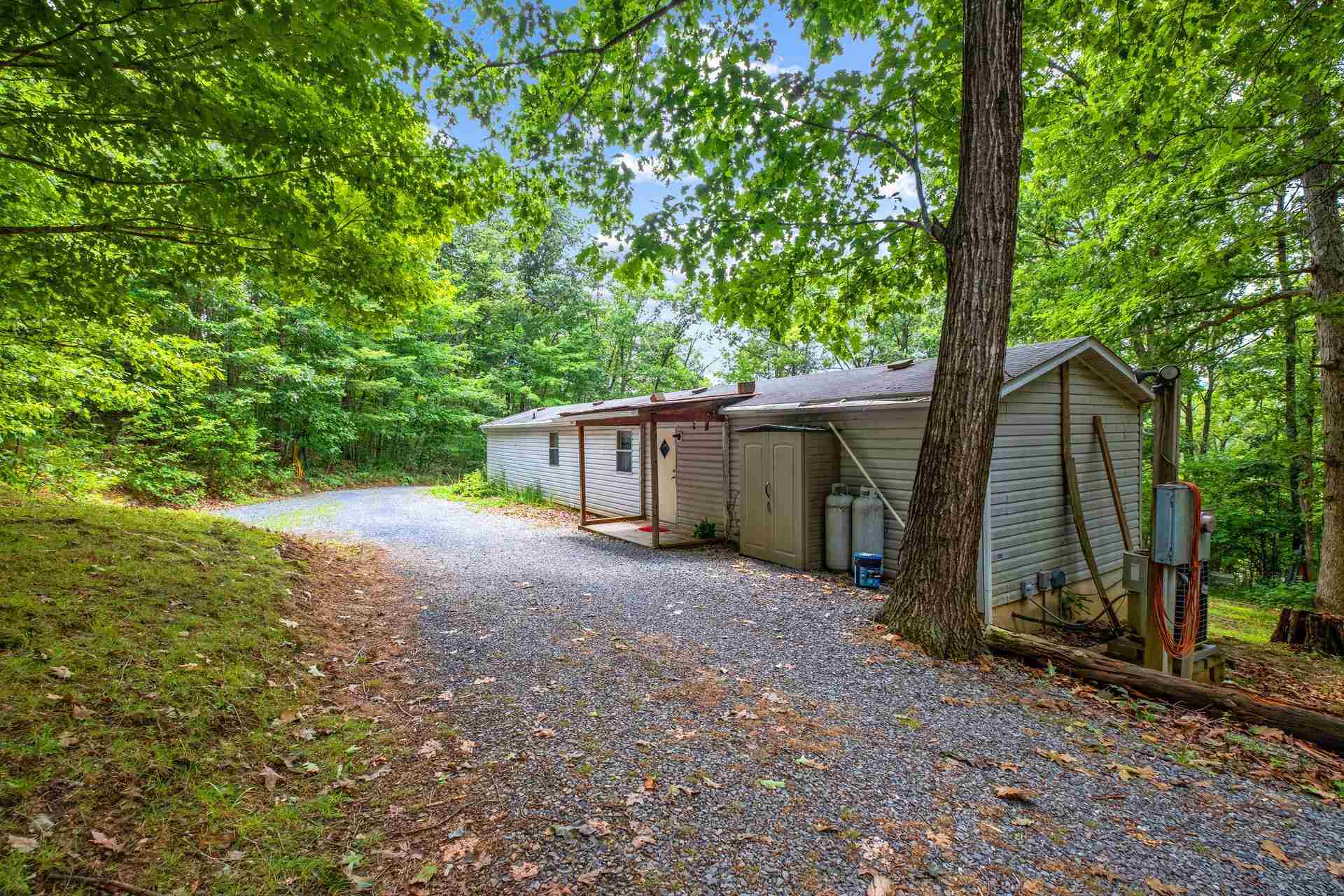 1372 Miller Farm Road Staunton, VA 24401 - Photo 13 of 27 a view of a house with backyard and trees