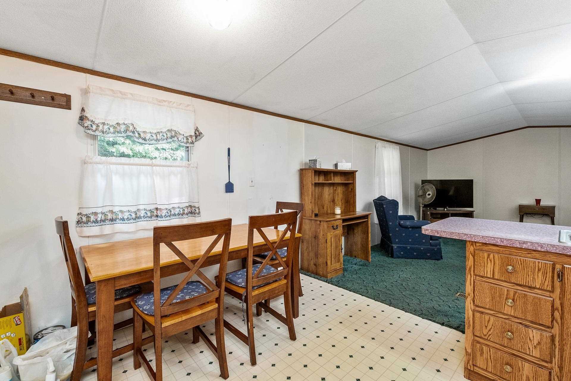 1372 Miller Farm Road Staunton, VA 24401 - Photo 18 of 27 a dining room with a table and chairs