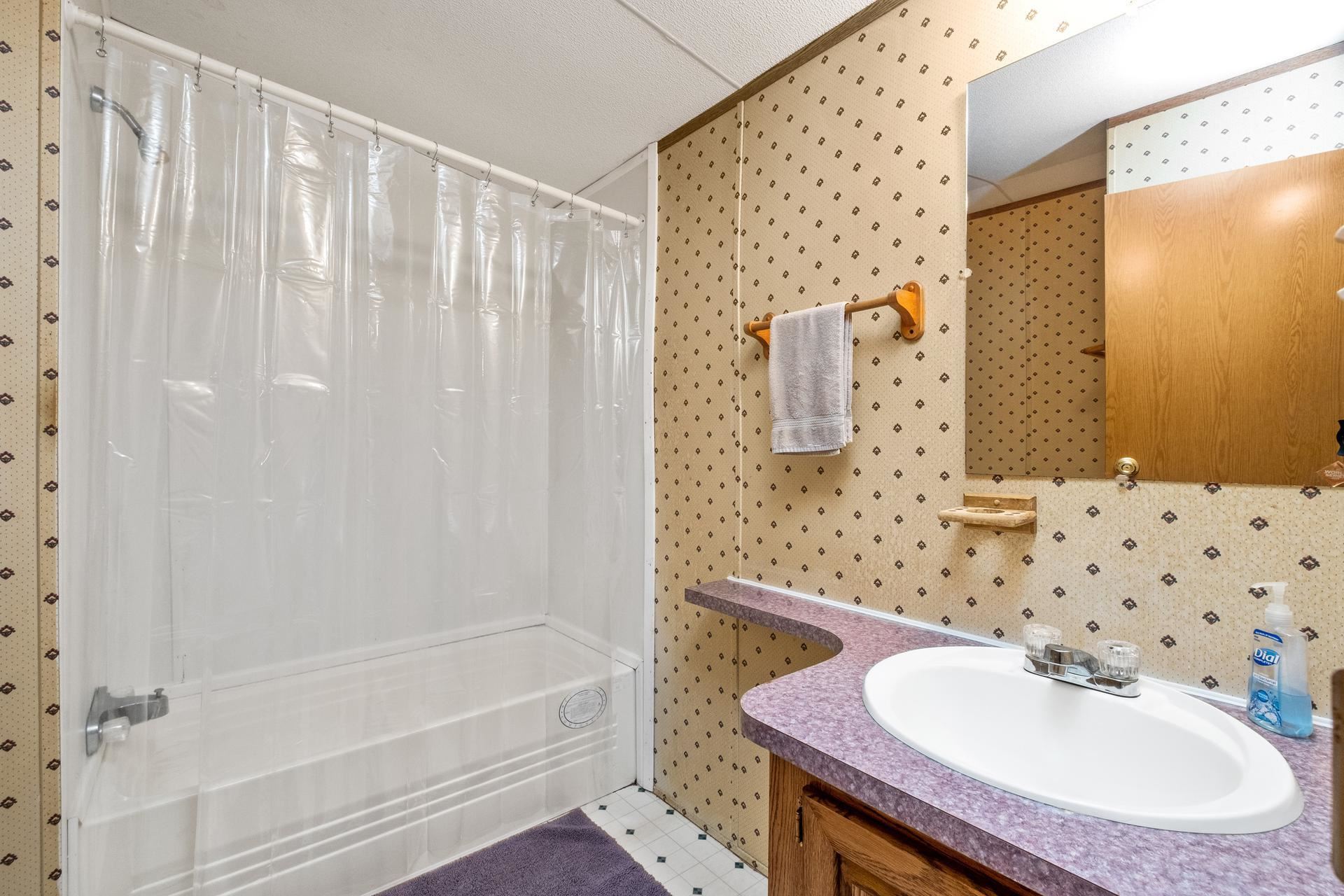 1372 Miller Farm Road Staunton, VA 24401 - Photo 24 of 27 a bathroom with a sink and a mirror