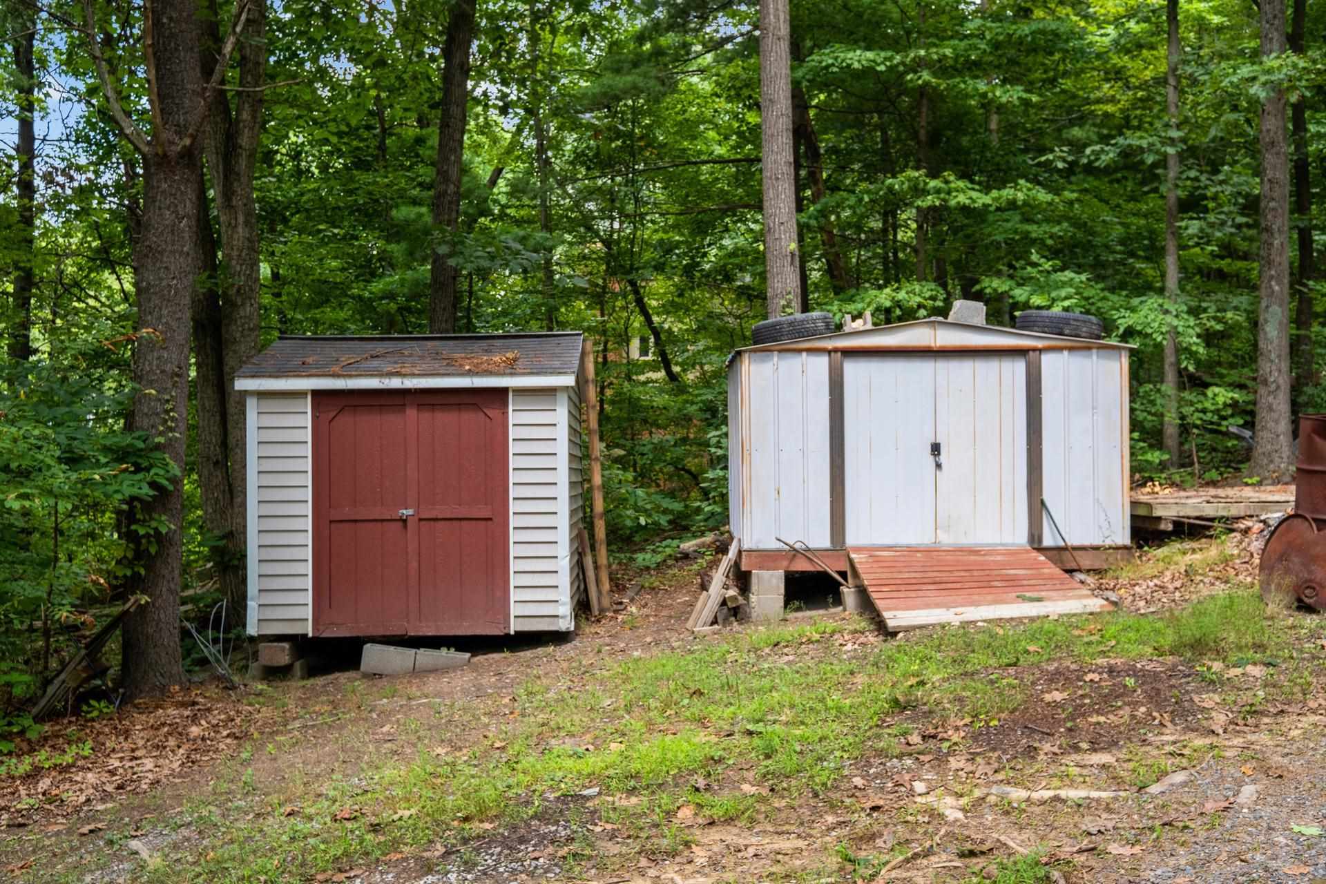 1372 Miller Farm Road Staunton, VA 24401 - Photo 27 of 27 a backyard of a house with a yard and garage