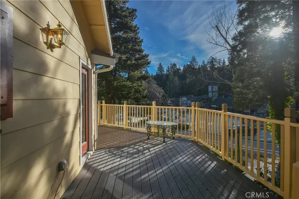 a view of a backyard with a fence