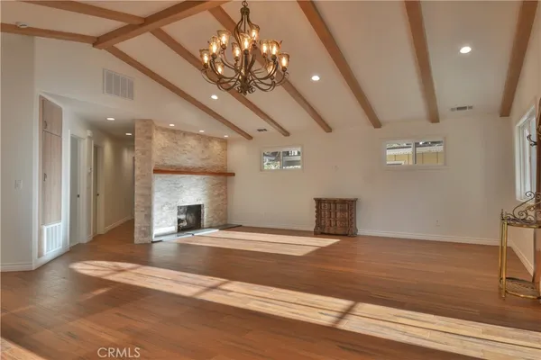 a view of a hallway with a chandelier