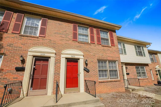 a front view of residential houses