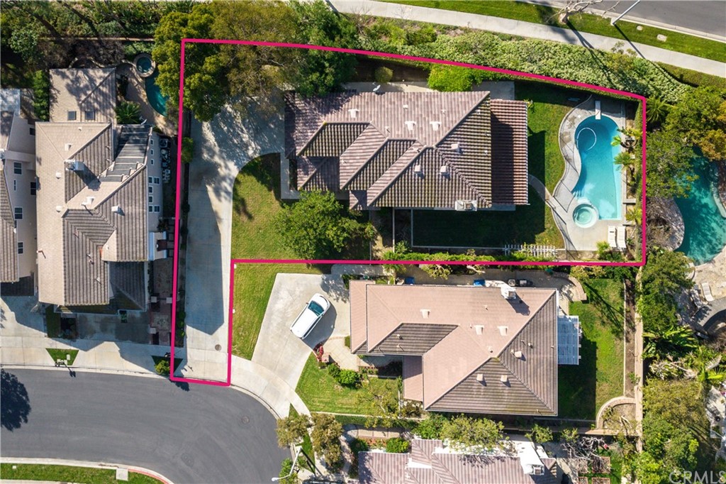 24 Silveroak Irvine, CA 92620 - Photo 1 of 23 an aerial view of a house with swimming pool and outdoor seating