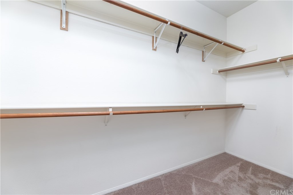 24 Silveroak Irvine, CA 92620 - Photo 19 of 23 a view of a room with racks on the wall