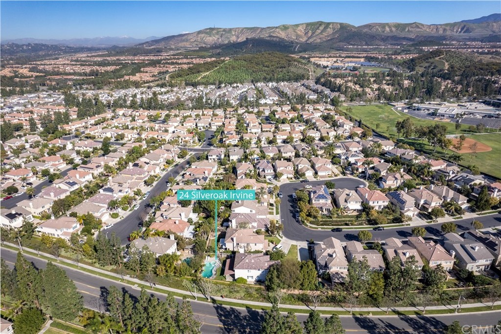 24 Silveroak Irvine, CA 92620 - Photo 2 of 23 an aerial view of residential houses with outdoor space