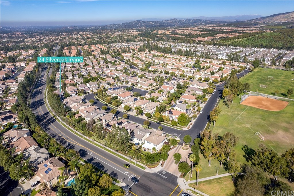 24 Silveroak Irvine, CA 92620 - Photo 23 of 23 an aerial view of residential houses with outdoor space