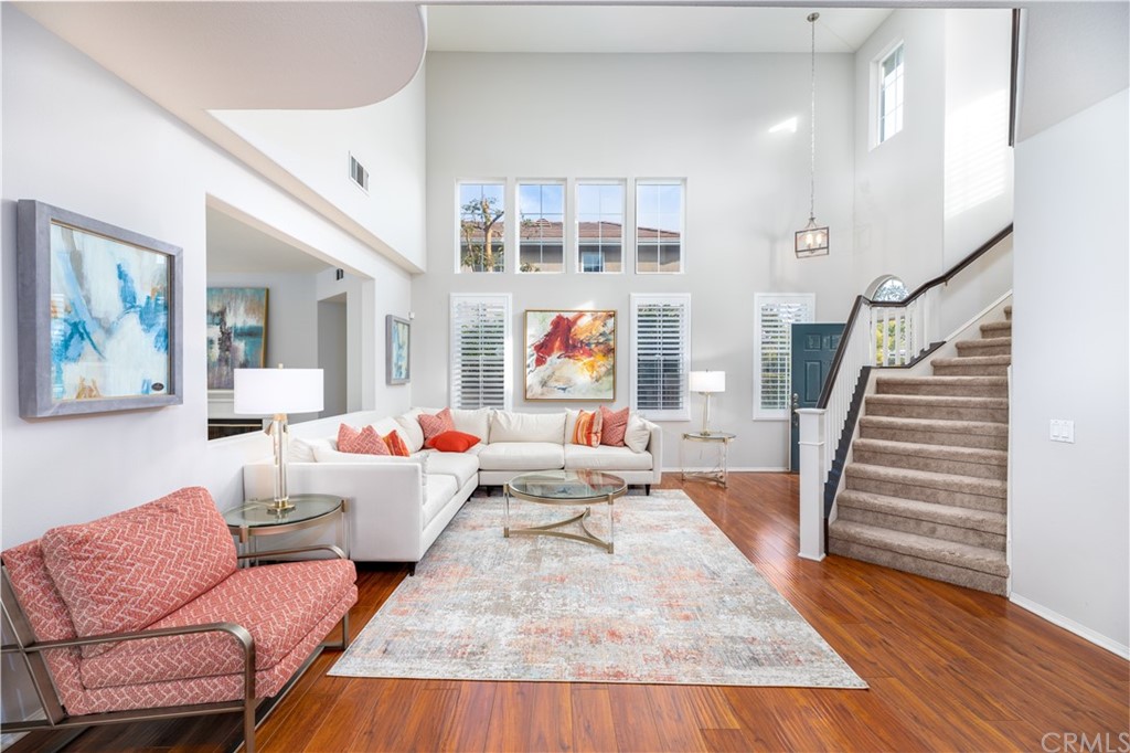 24 Silveroak Irvine, CA 92620 - Photo 5 of 23 a living room with furniture and wooden floor