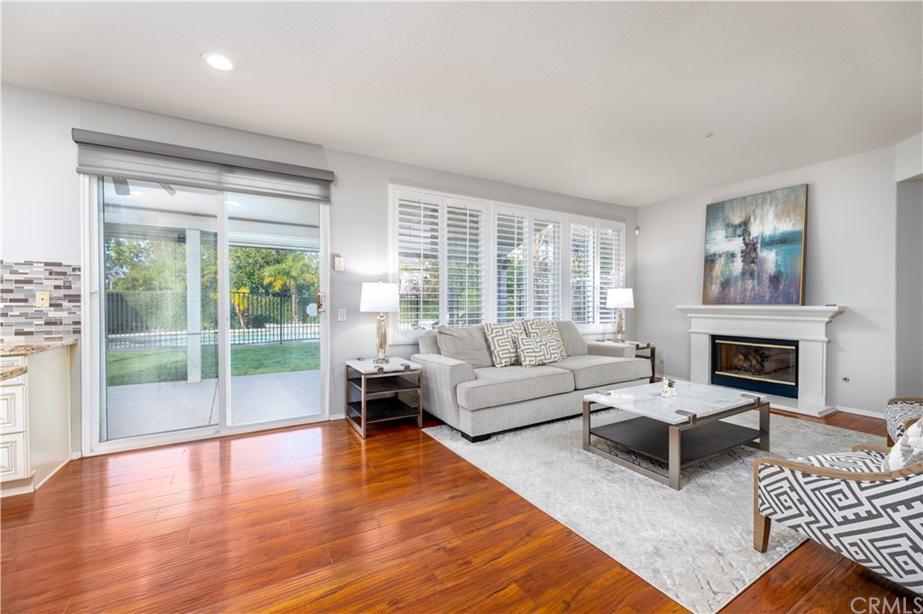 24 Silveroak Irvine, CA 92620 - Photo 6 of 23 a living room with furniture and a fireplace