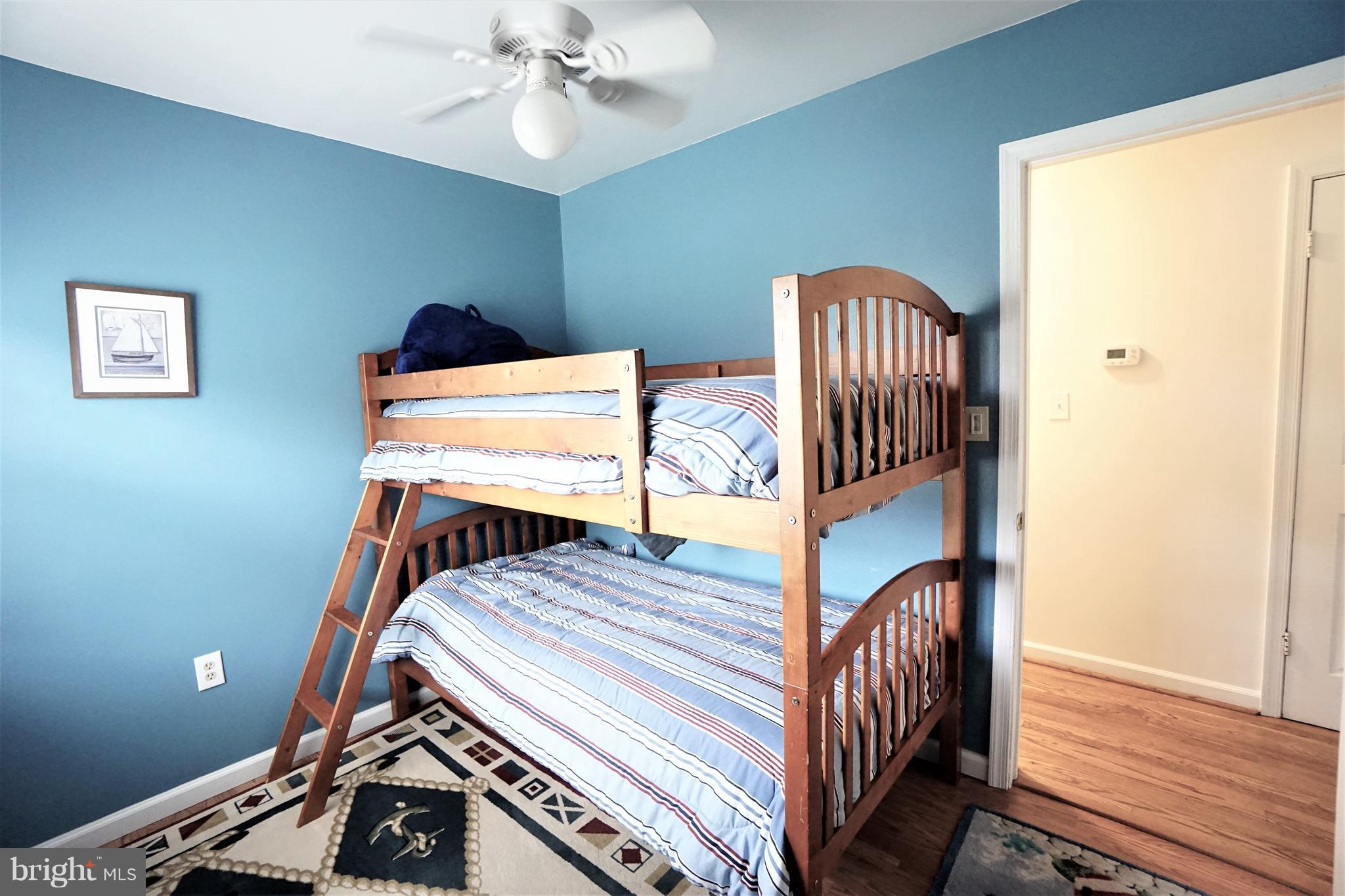 38 Peach Tree Drive Ranson, WV 25438 - Photo 14 of 30 a bedroom with furniture and wooden floor