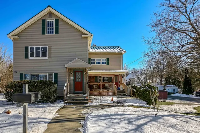 a front view of a house with street