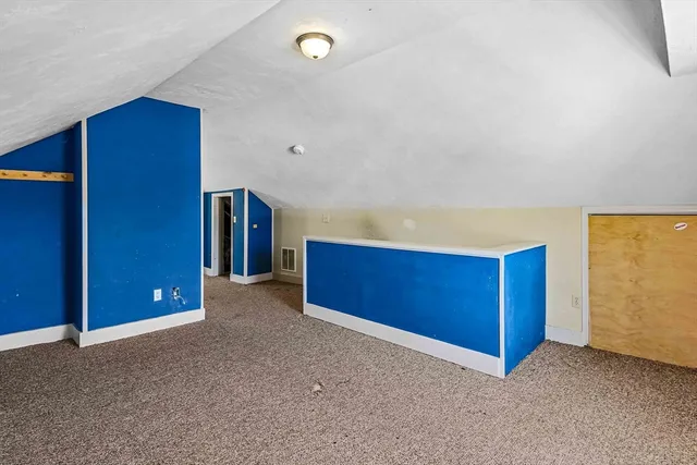 a view of a livingroom with a hallway