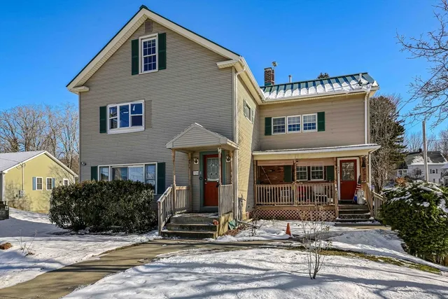 a view of a house with a garden