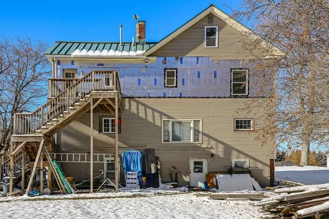 a front view of a house with roof