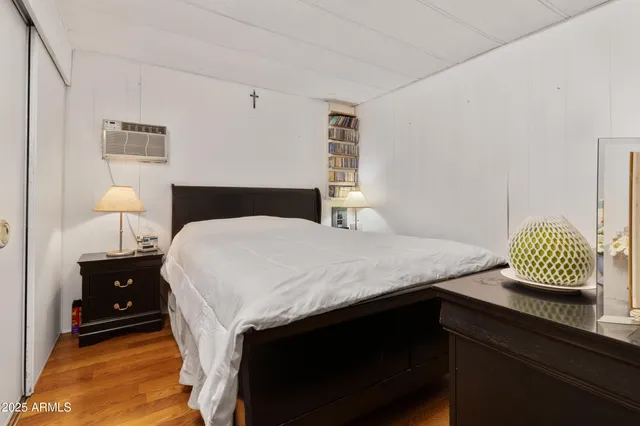 a front view of a house with a yard and outdoor seating