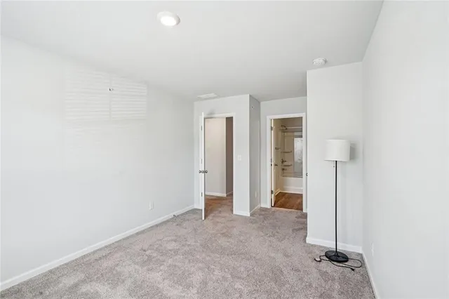 an empty room with a door