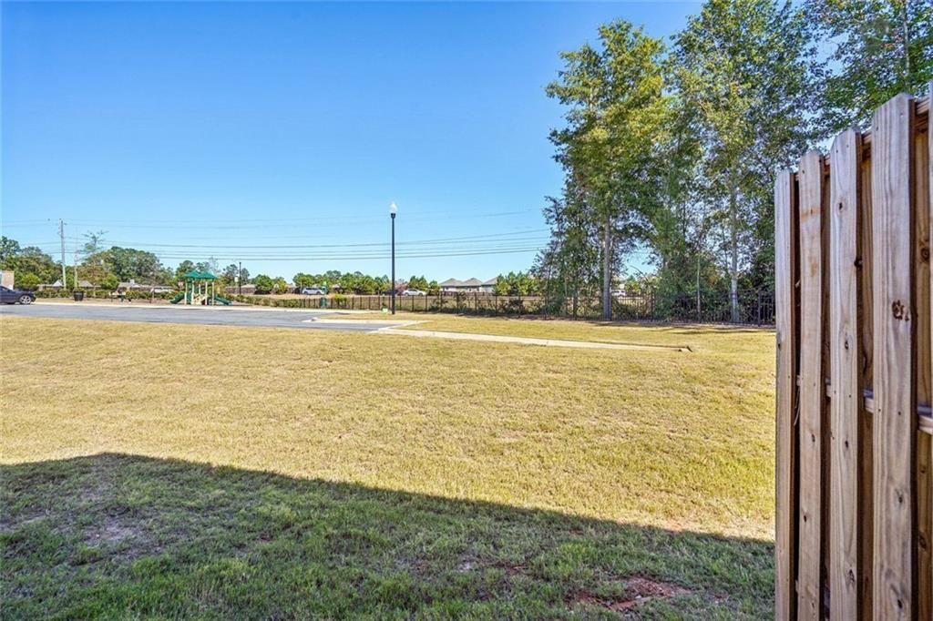 11692 Mendenhall Court Hampton, GA 30228 - Photo 8 of 25 a view of an ocean from a balcony